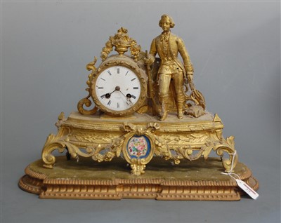 Lot 19 - A late 19th century French gilt metal mantel...