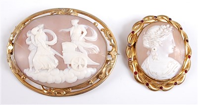 Lot 2585 - Two yellow metal oval shell cameo brooches,...