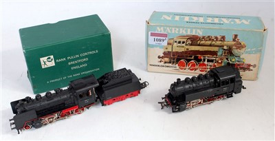 Lot 1089 - A Marklin HO Ref. 3031 black 0-8-0 tank engine...