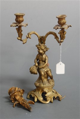Lot 54 - A late 19th century gilt metal three sconce...