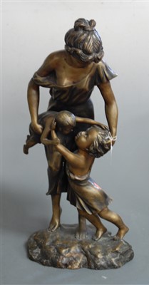 Lot 81 - A large modern bronzed figure of a mother and...