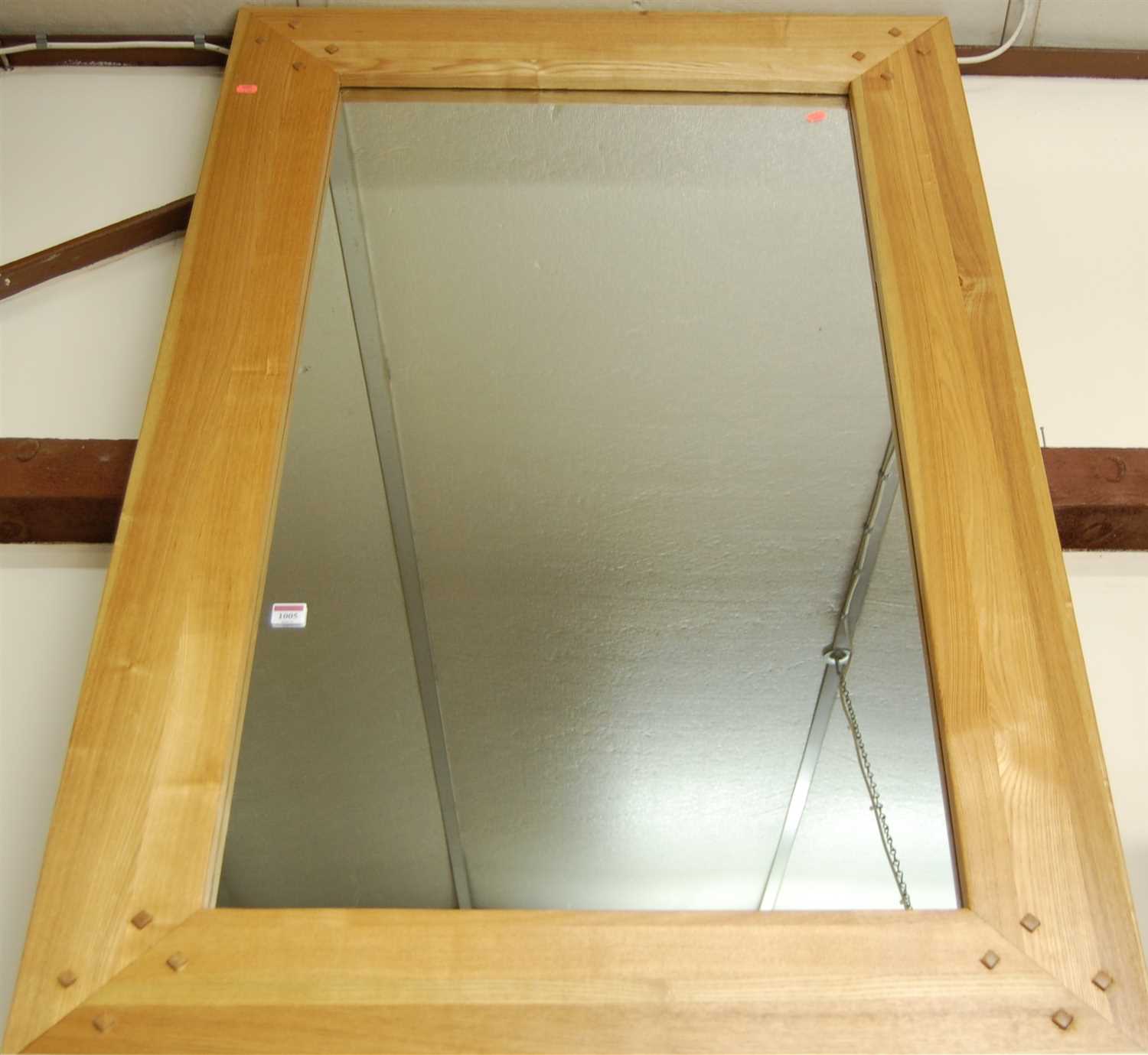 Lot 1005 - A contemporary blond oak wall mirror, 137 x 91cm