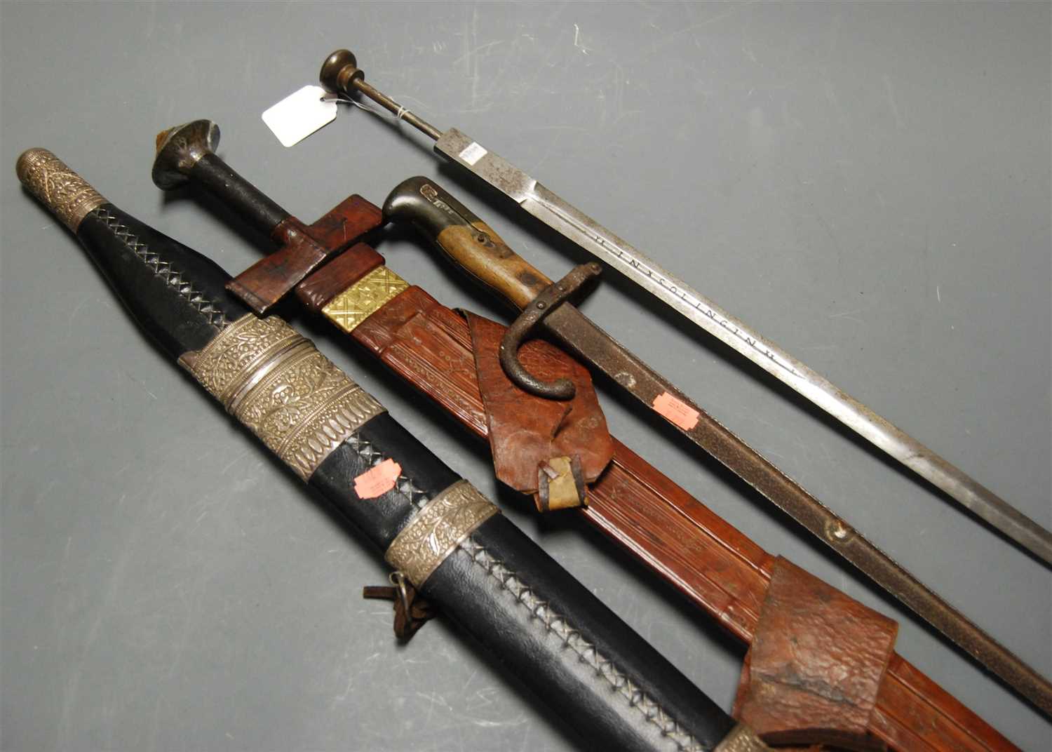 Lot 519 - A modern Eastern sword, having a 69cm blade,...