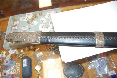 Lot 519 - A modern Eastern sword, having a 69cm blade,...