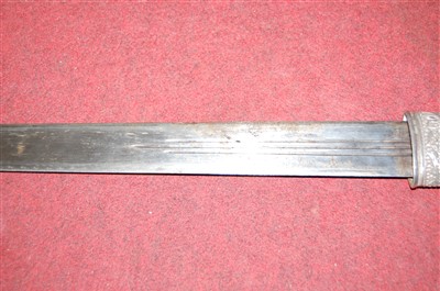 Lot 519 - A modern Eastern sword, having a 69cm blade,...