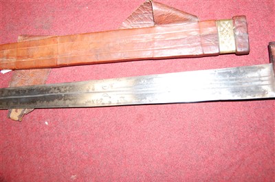 Lot 519 - A modern Eastern sword, having a 69cm blade,...