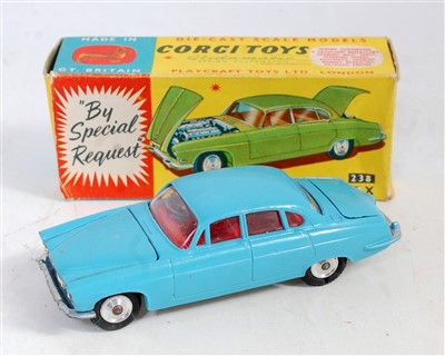 Lot 1680 - A Corgi Toys No. 238 Jaguar Mk X, comprising...