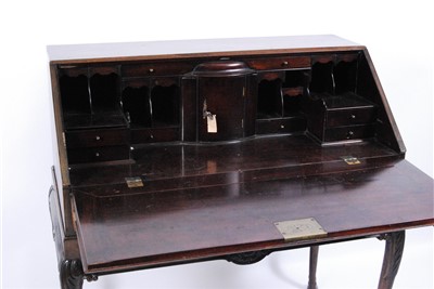Lot 1398 - An antique mahogany writing bureau, the...