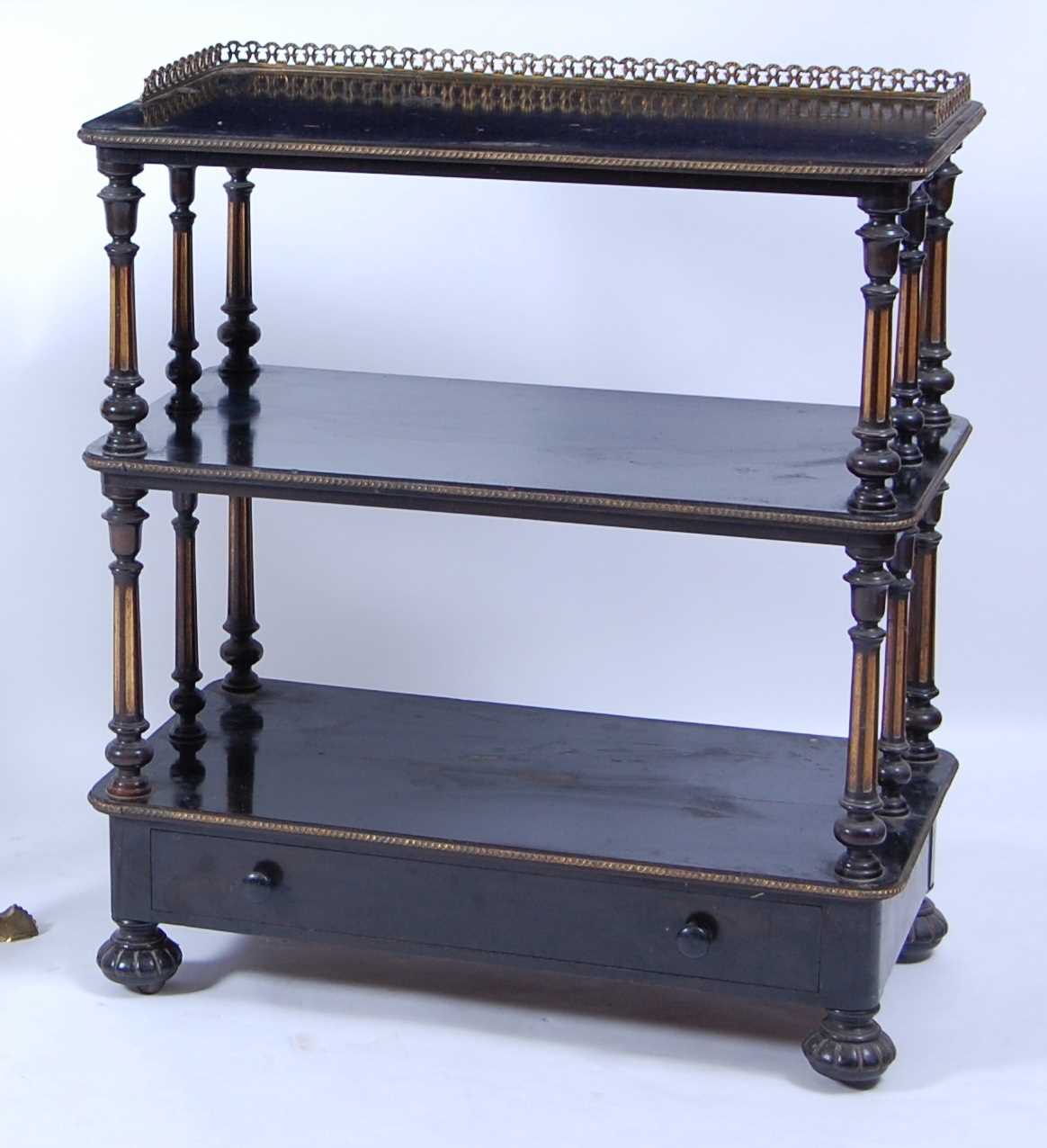 Lot 1436 - A Victorian ebonised and parcel gilt decorated...