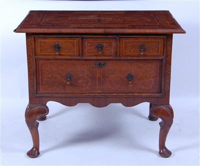 Lot 1446 - A walnut and seaweed marquetry lowboy, early...