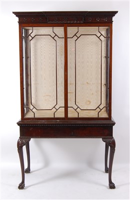 Lot 1421 - A circa 1900 mahogany cabinet on stand, in the...