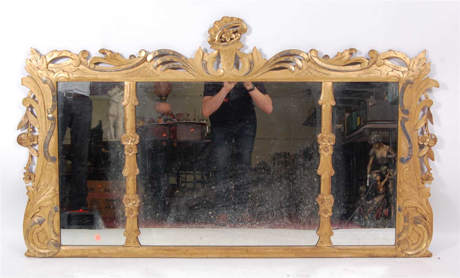 Lot 1494 - A 19th century carved giltwood chimney mirror,...
