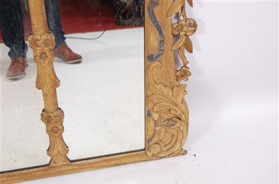 Lot 1494 - A 19th century carved giltwood chimney mirror,...