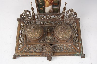 Lot 1270 - A Victorian brass desk stand, the raised back...