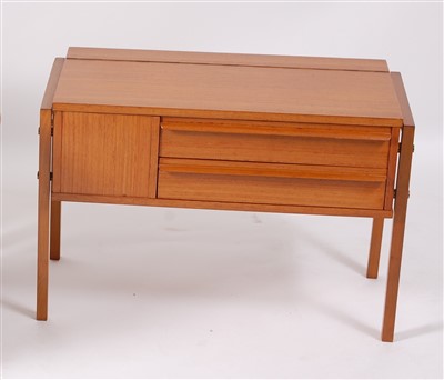 Lot 435 - A 1970s teak low hinged top two drawer cutlery...