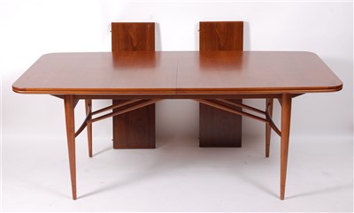 Lot 488 - A 1960s teak round cornered extending dining...