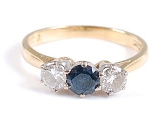 Lot 2604 - An 18ct yellow and white gold, sapphire and...