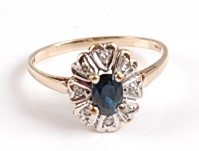 Lot 2570 - A 9ct yellow and white gold, sapphire and...