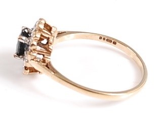 Lot 2570 - A 9ct yellow and white gold, sapphire and...