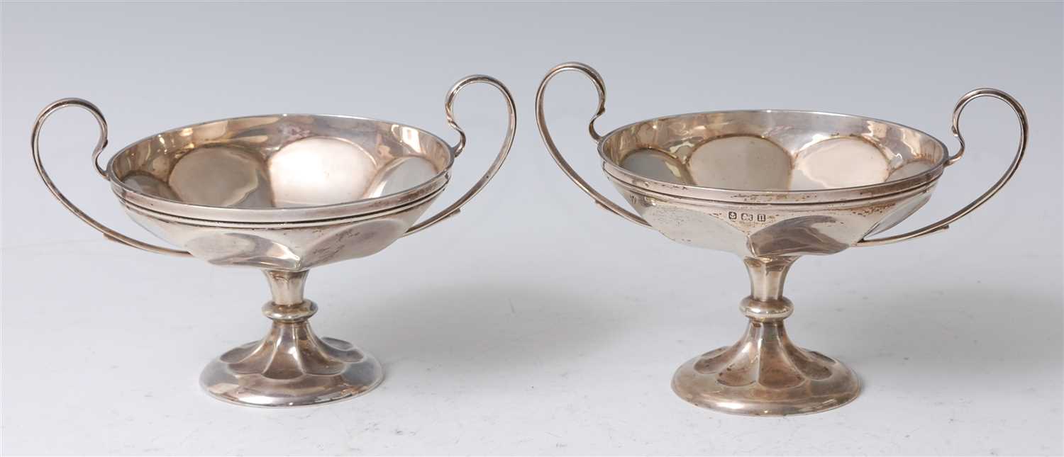 Lot 233 - A pair of late Art Nouveau silver pedestal...