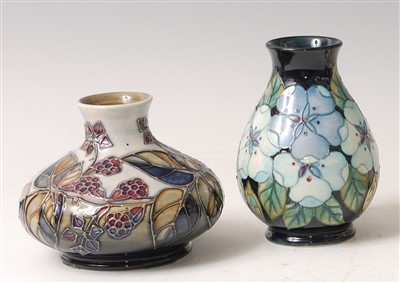 Lot 168 - A Moorcroft pottery squat vase in the Bramble...