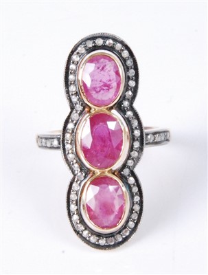 Lot 1181 - A yellow metal, ruby and diamond vertical...