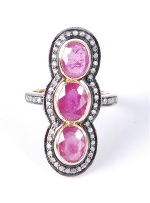 Lot 1181 - A yellow metal, ruby and diamond vertical...