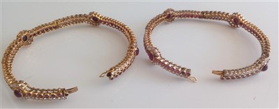 Lot 1208 - A pair of yellow metal, ruby and diamond...