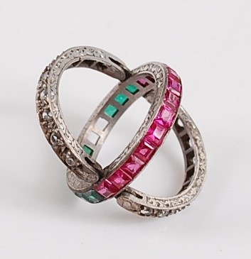 Lot 1185 - A white metal hinged ruby, green garnet and...