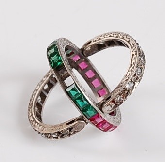 Lot 1185 - A white metal hinged ruby, green garnet and...