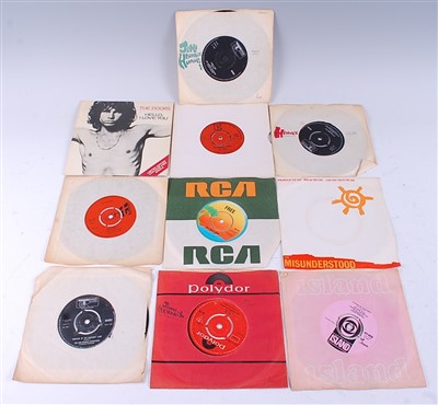 Lot 656 - A collection of ten 7" vinyl records to include