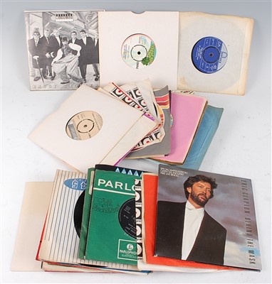 Lot 655 - A collection of 7" vinyl records to include