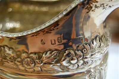 Lot 1080 - A late Georgian Irish silver three-piece tea...
