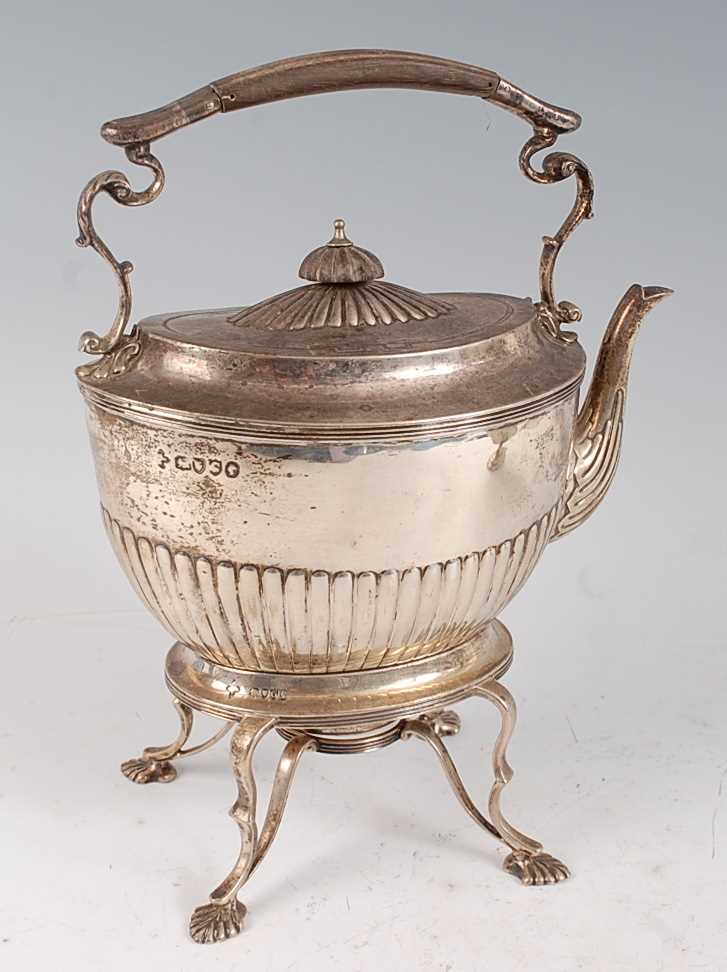 Lot 1081 - A Victorian silver spirit kettle on stand, the...