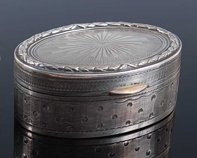 Lot 1120 - A circa 1900 continental silver pocket snuff...
