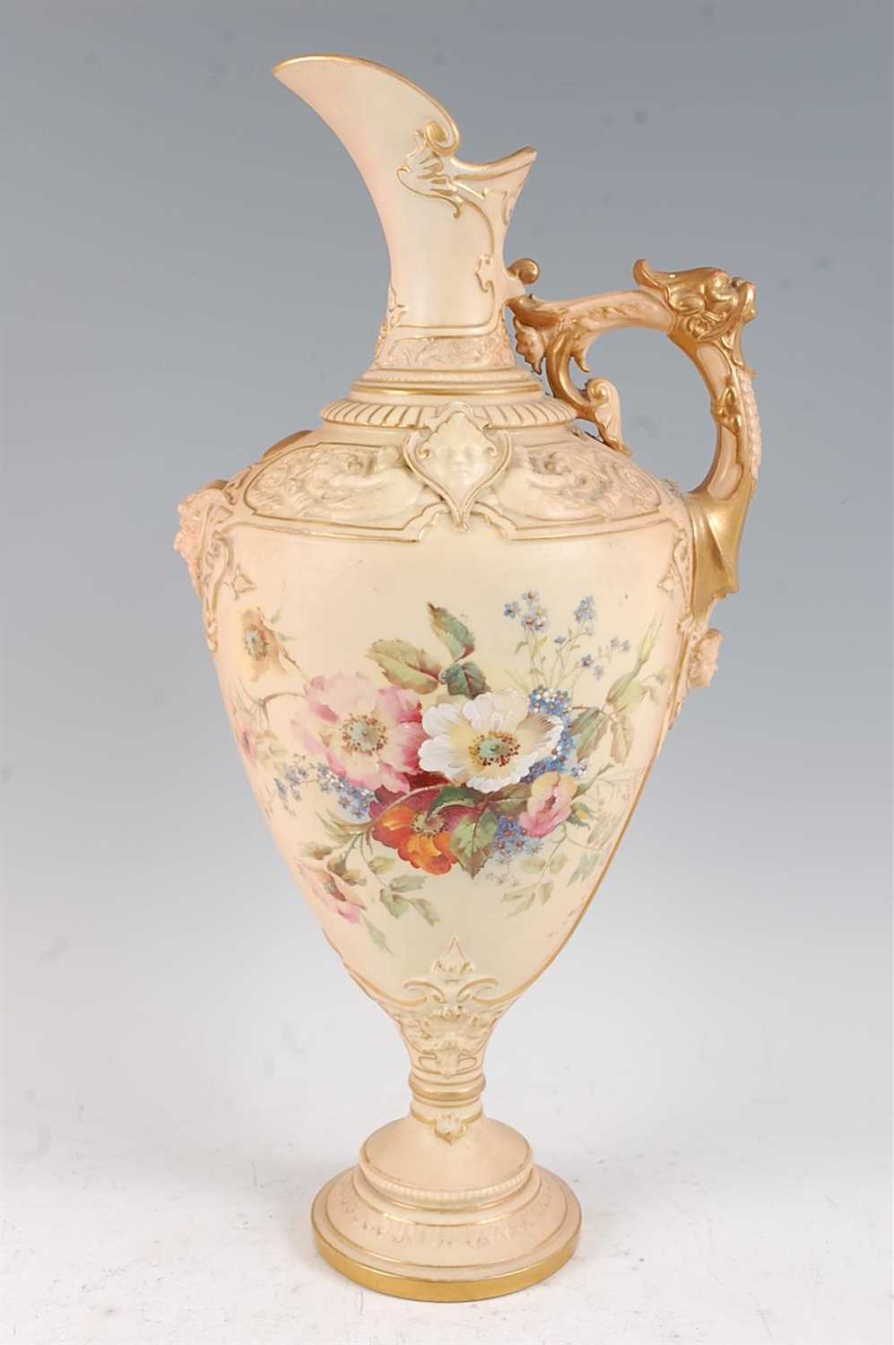 Lot 1035 - A large Royal Worcester blush ivory ewer, the...