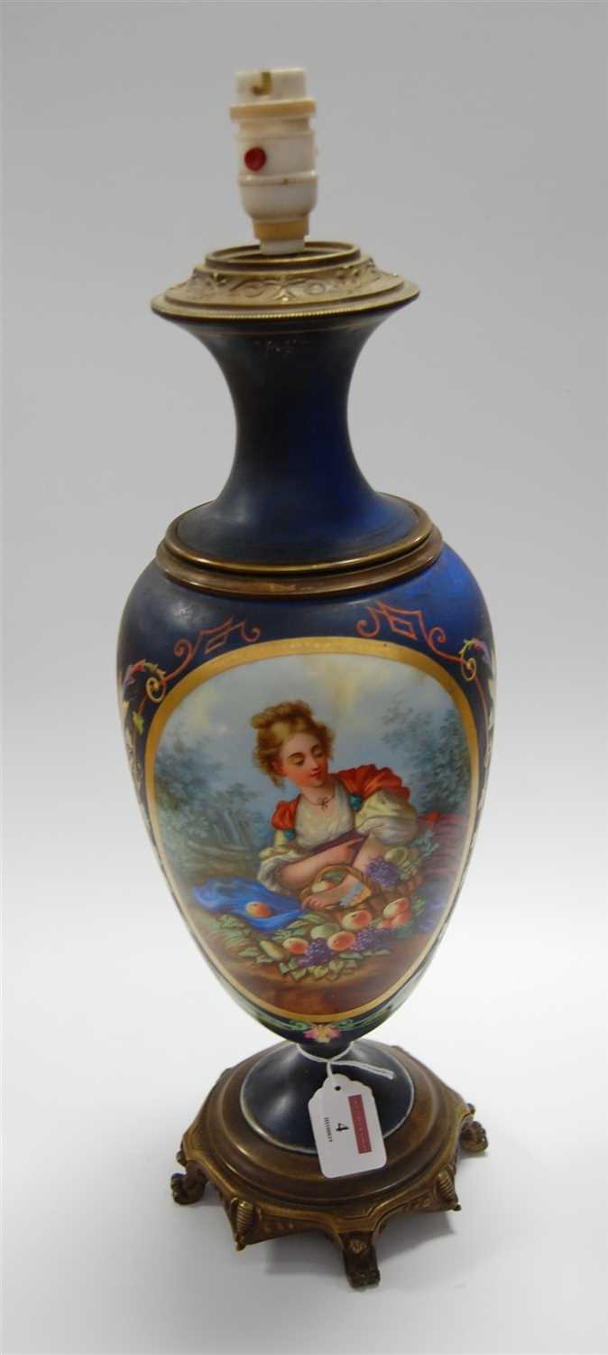 Lot 4 - A late 19th century continental porcelain and...