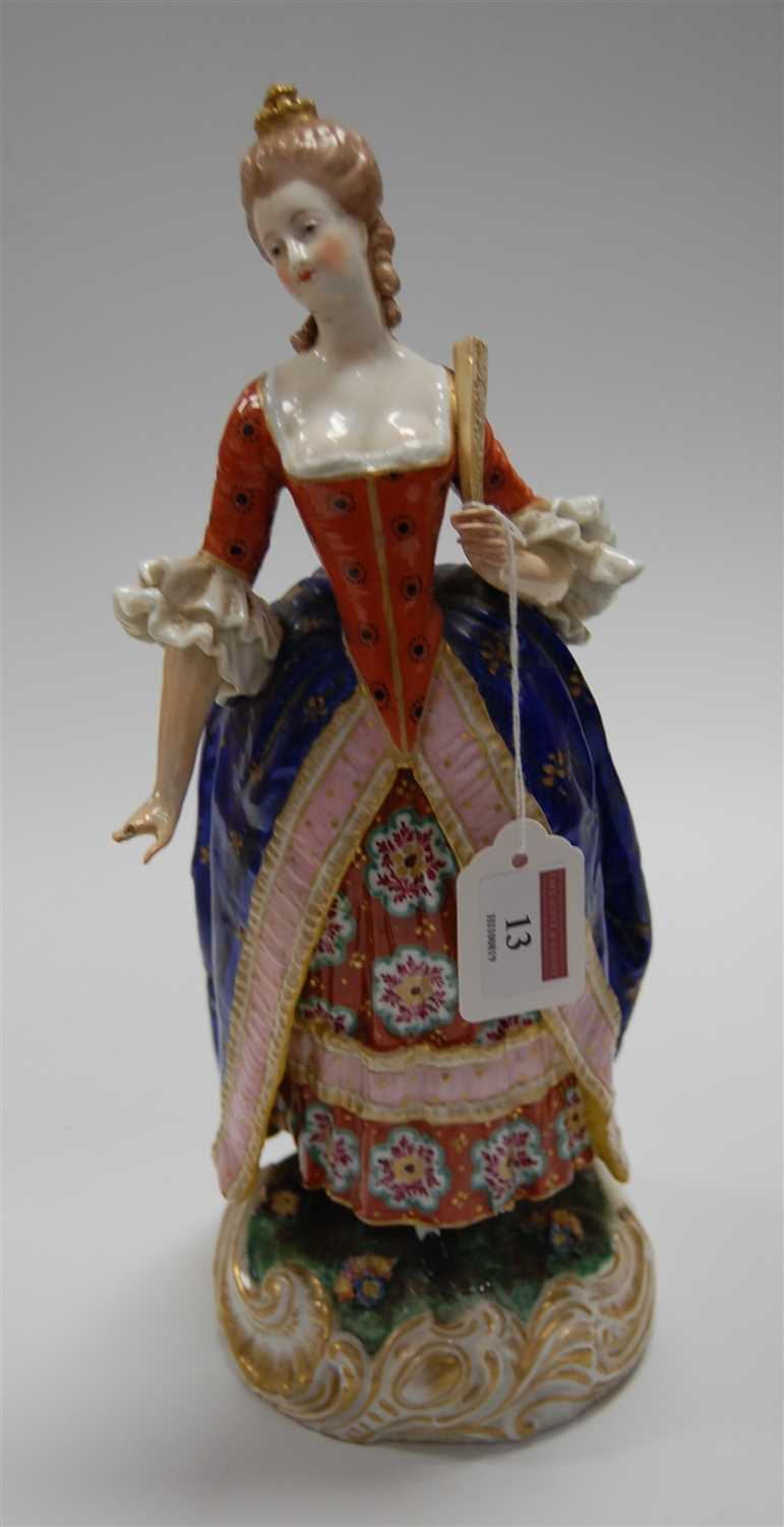 Lot 13 - A 19th century continental porcelain figure of...