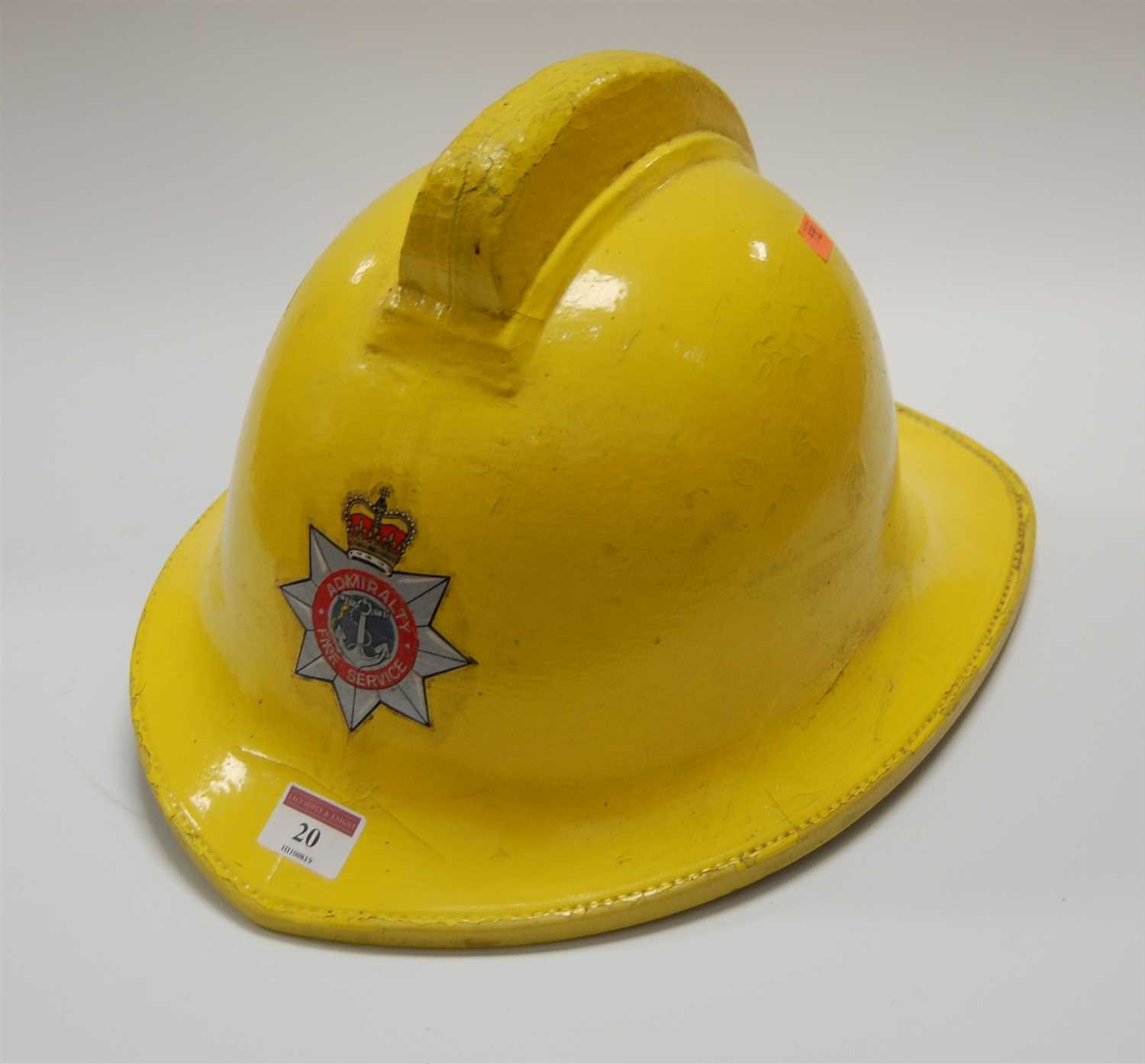 Lot 20 - An Admiralty Fire Service fireman's helmet,...