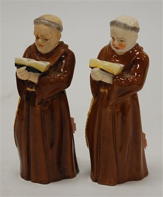Lot 175 - A pair of Royal Worcester figural candle...