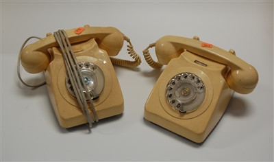 Lot 61 - Two GPO cream bakelite telephones; together...