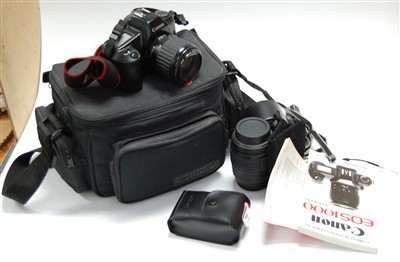 Lot 94 - A Canon EOS 1000 digital camera together with...