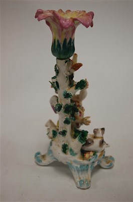 Lot 197 - An early 19th century Derby? porcelain candle...