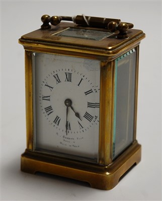 Lot 253 - A lacquered brass minuet carriage clock,...