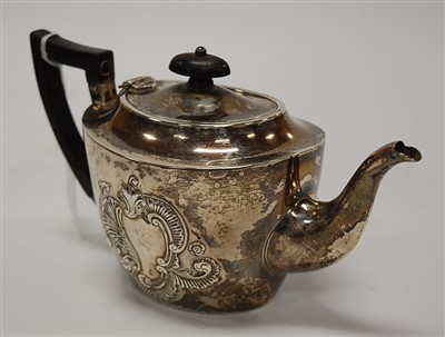 Lot 214 - A late Victorian silver and embossed teapot of...
