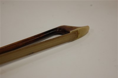 Lot 517 - A Golden Strand cello bow, 67cm