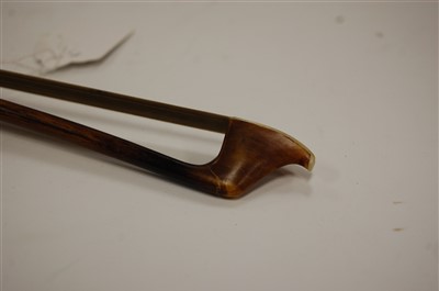 Lot 517 - A Golden Strand cello bow, 67cm