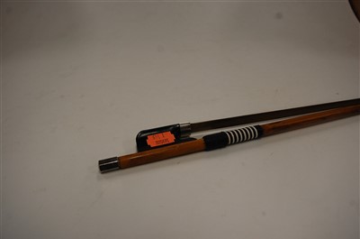 Lot 517 - A Golden Strand cello bow, 67cm