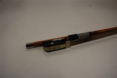 Lot 517 - A Golden Strand cello bow, 67cm