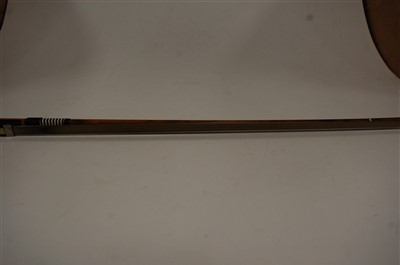 Lot 517 - A Golden Strand cello bow, 67cm